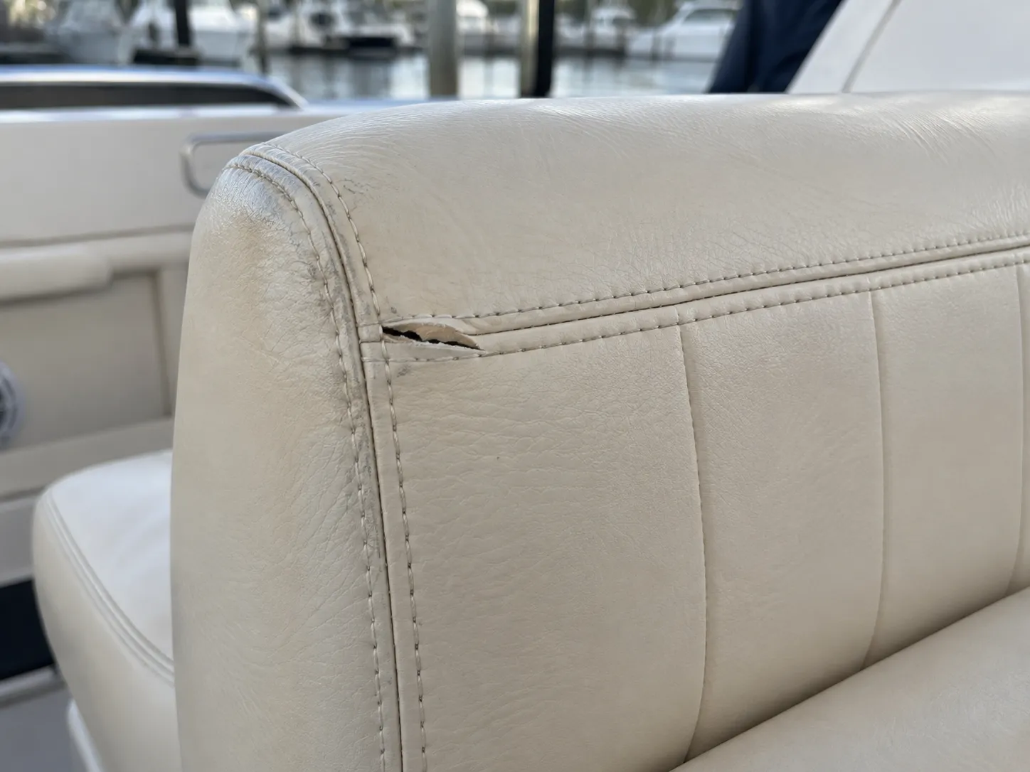Illustrative view of split marine upholstery and edge wear