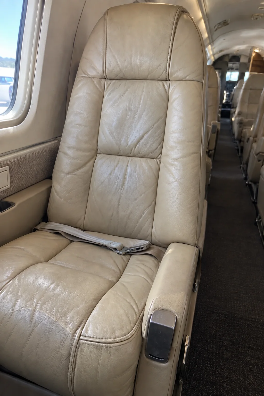 The same illustrative aircraft seat after restoration