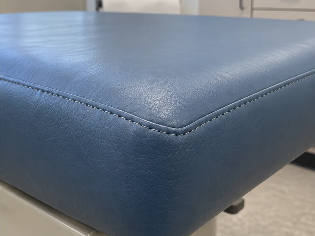 Illustrative view of the exam table with a repaired corner